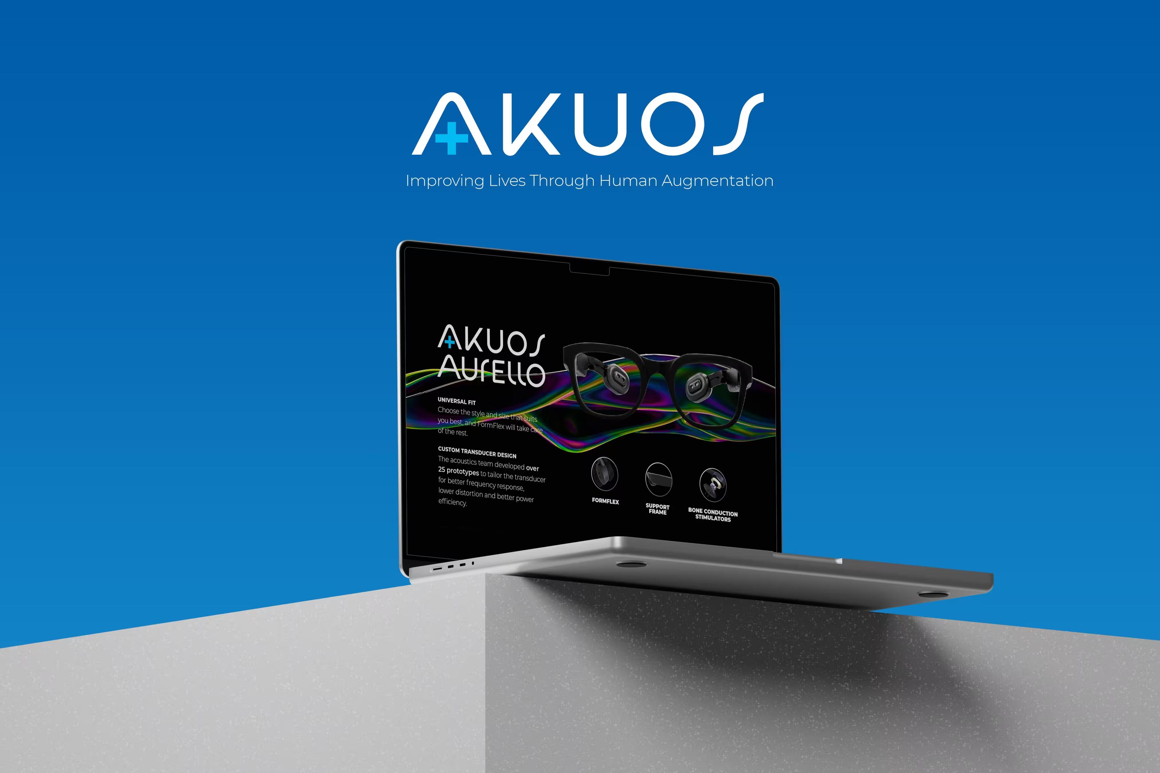 A laptop on a concrete plinth showing the Aurello product slide, smart eyewear against ribbons of coloured light.