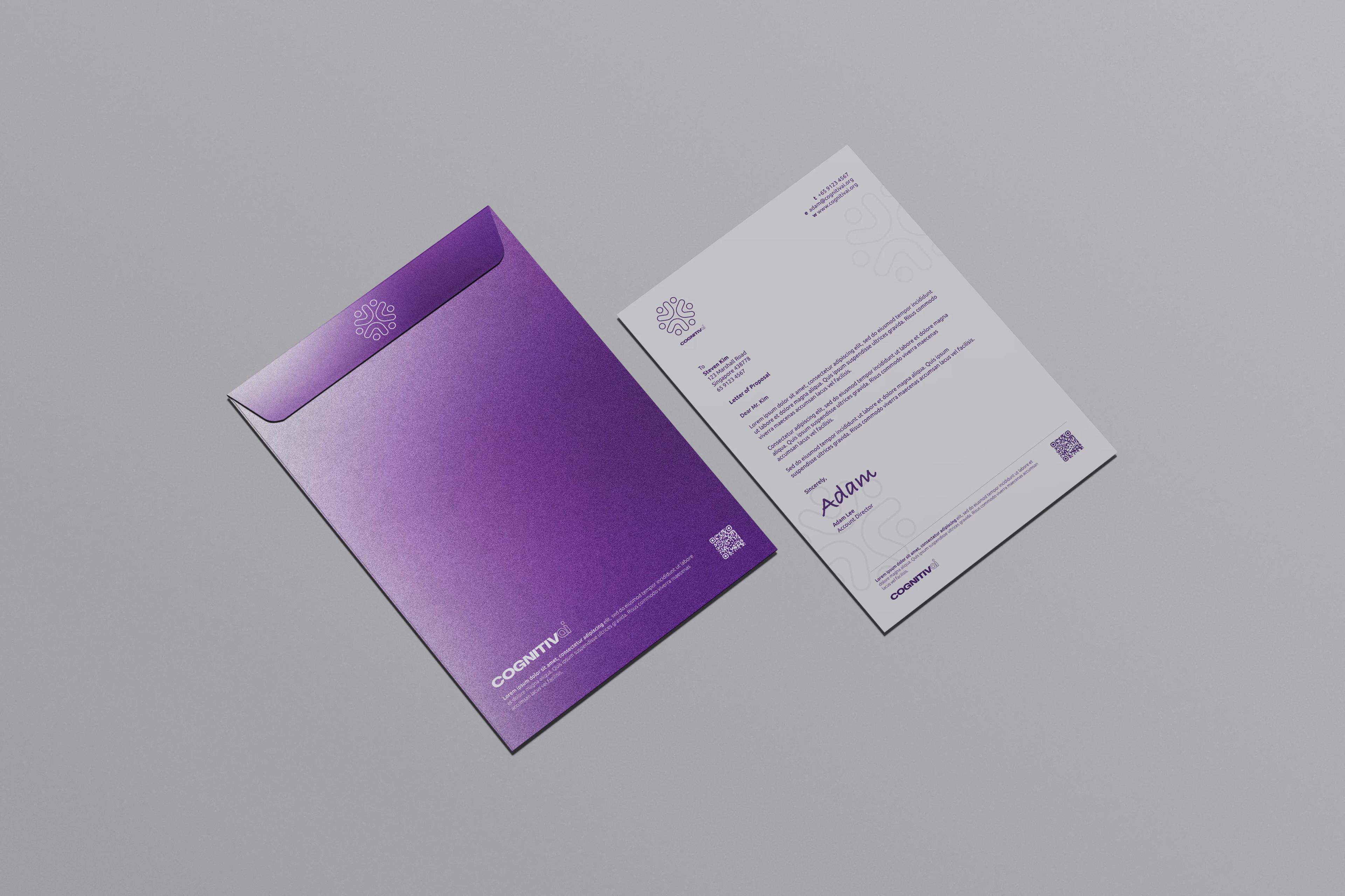A purple envelope beside a letterhead printed with a faint pattern of the brand monogram.