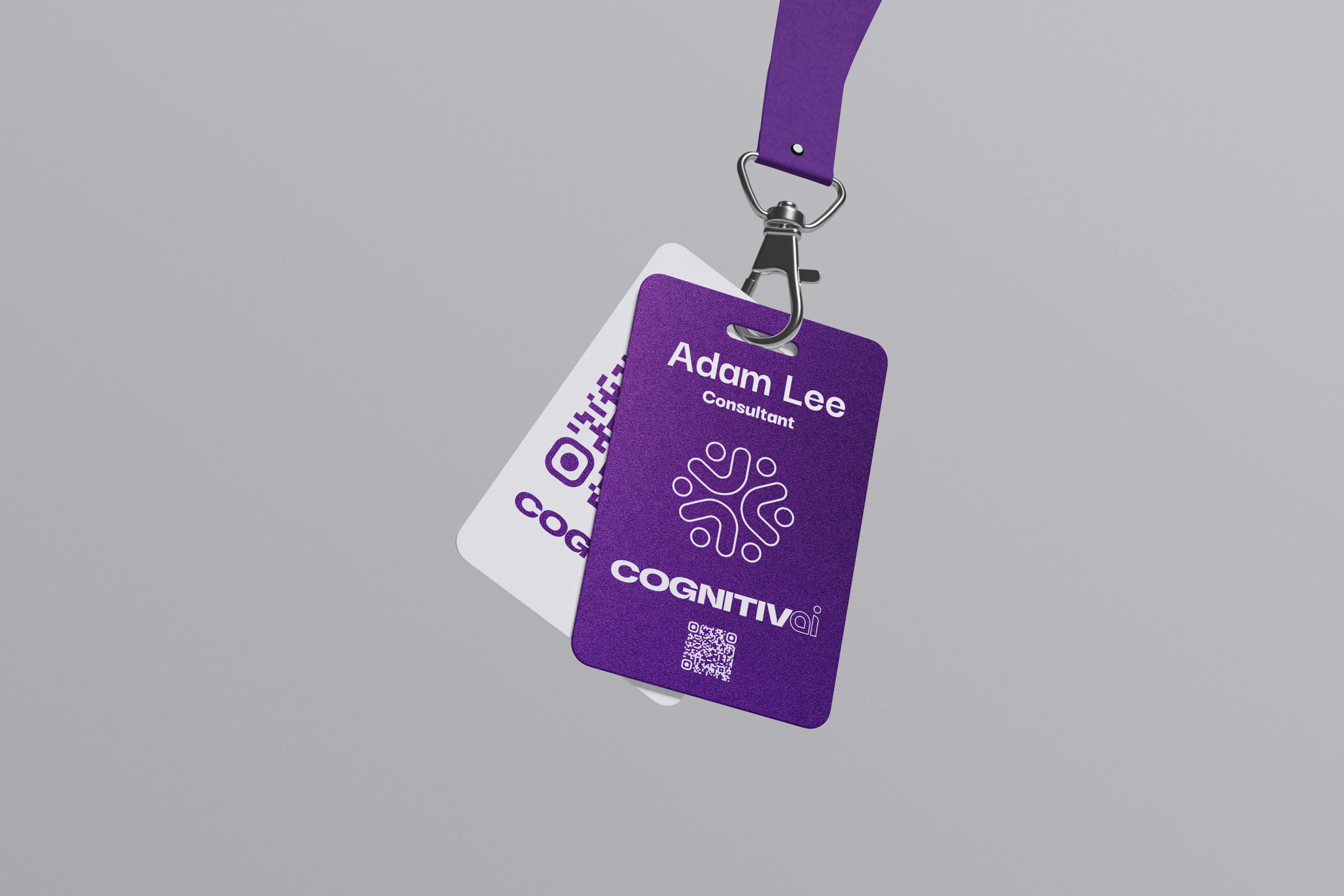 A purple lanyard badge for a named consultant, carrying the monogram, wordmark and a QR code.